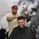 Jay Kizito Byrne Cutting Mans Hair